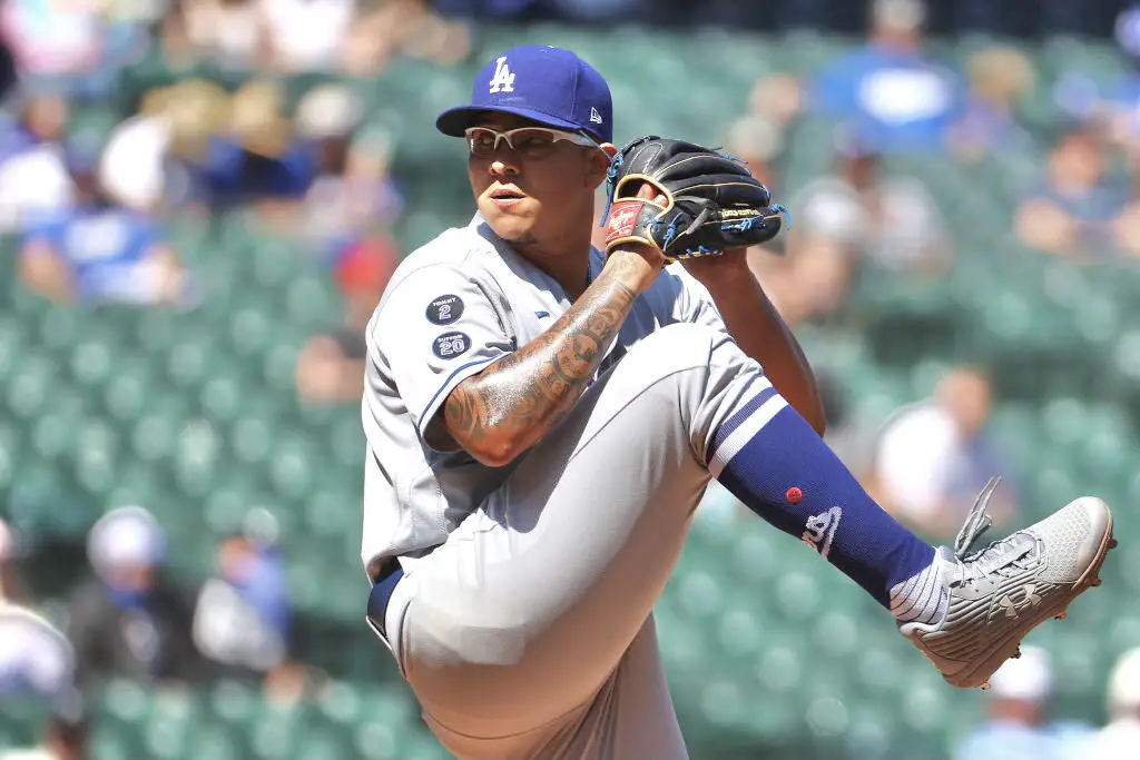 SEATTLE, WASHINGTON - APRIL 20: Julio Urias #7 of the Los Angeles Dodgers pitches during the first inning against the Seattle Mariners at T-Mobile Park on April 20, 2021 in Seattle, Washington. (Photo by Abbie Parr/Getty Images)