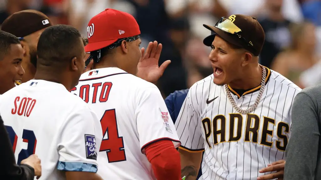 DENVER, COLORADO - JULY 12: Juan Soto #22 of the Washington Nationals celebrates with Manny Machado #13 of the San Diego Padres during the 2021 T-Mobile Home Run Derby at Coors Field on July 12, 2021 in Denver, Colorado. (Photo by Justin Edmonds/Getty Images)
