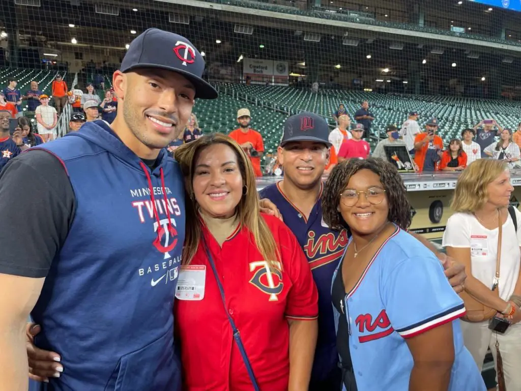 Minnesota Twins' Carlos Correa and Daniella Correa await the