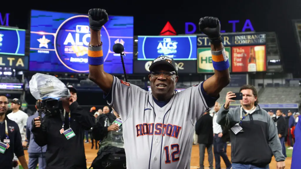 NEW YORK, NEW YORK - OCTOBER 23: Manager Dusty Baker Jr. #12 of the Houston Astros celebrates after winning game four of the American League Championship Series against the New York Yankees to advance to the World Series at Yankee Stadium on October 23, 2022 in the Bronx borough of New York City. (Photo by Elsa/Getty Images)