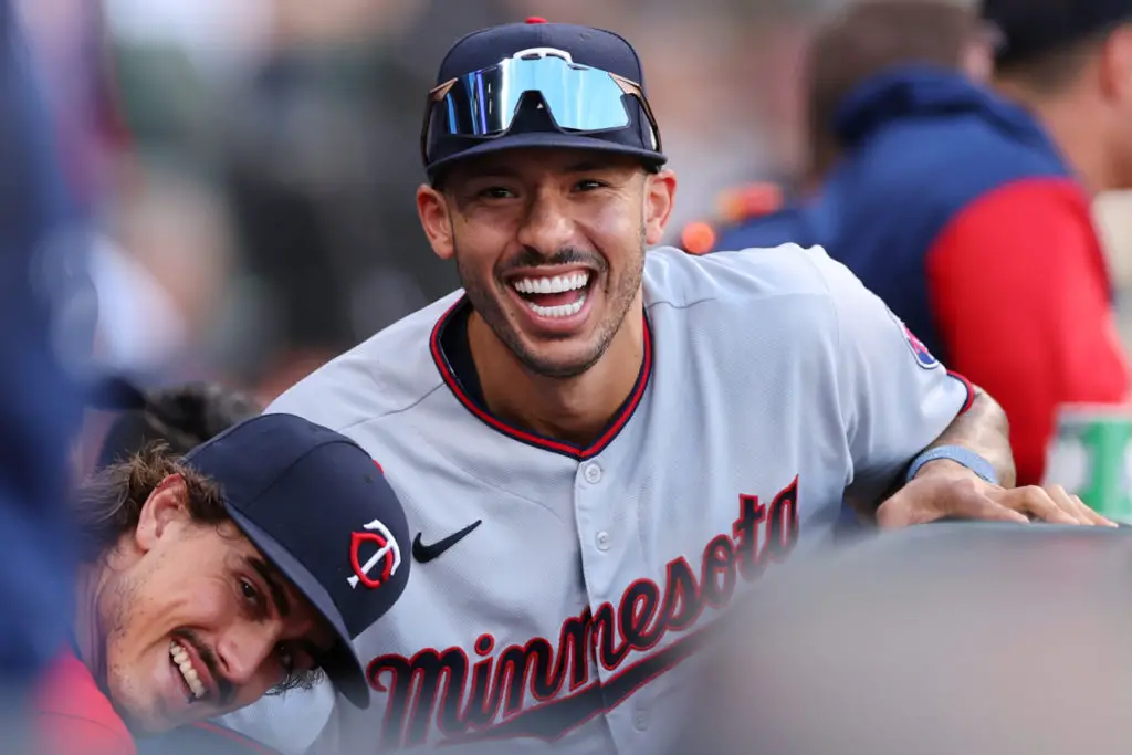 CHICAGO, ILLINOIS - OCTOBER 05: Carlos Correa #4 of the Minnesota Twins looks on against the Chicago White Sox at Guaranteed Rate Field on October 05, 2022 in Chicago, Illinois. (Photo by Michael Reaves/Getty Images)