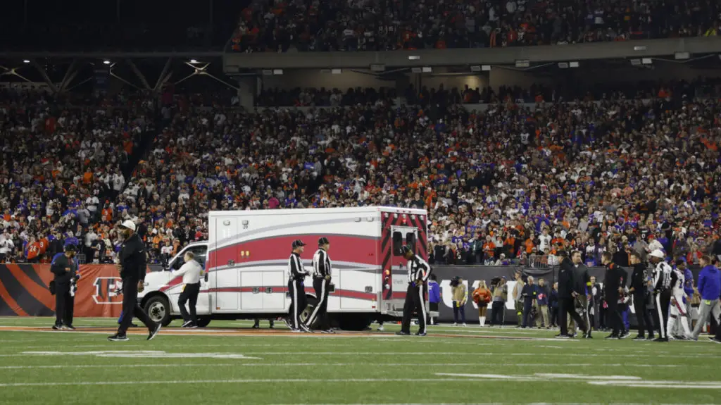 CINCINNATI, OHIO - JANUARY 02: Fans look on as the ambulance leaves carrying Damar Hamlin #3 of the Buffalo Bills after he collapsed after making a tackle against the Cincinnati Bengals during the first quarter at Paycor Stadium on January 02, 2023 in Cincinnati, Ohio. (Photo by Kirk Irwin/Getty Images)