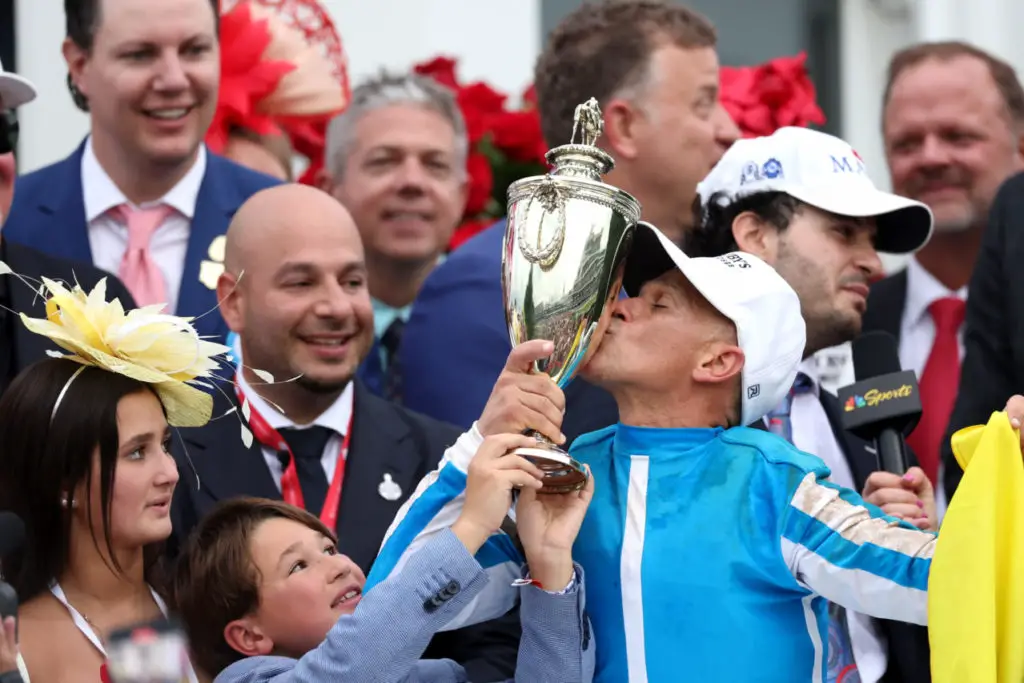 LOUISVILLE, KENTUCKY - MAY 06: Jockey Javier Castellano celebrates in winners circle after ridding Mage #8 to win the 149th running of the Kentucky Derby at Churchill Downs on May 06, 2023 in Louisville, Kentucky. (Photo by Rob Carr/Getty Images)