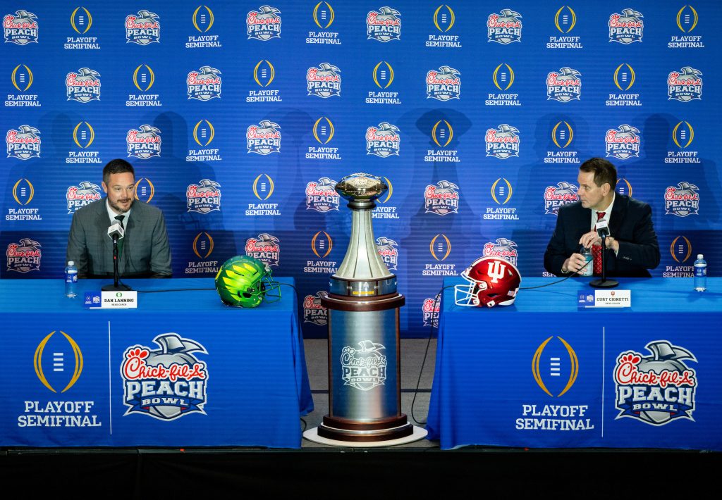 Oregon Ducks head coach Dan Lanning and Indiana Hoosiers head coach Curt Cignetti hold a joint press conference at the College Football Hall of Fame before the CFP semifinal at the Chick-fil-A Peach Bowl, Thursday, Jan. 8, 2026 in Atlanta.  (Jason Parkhurst via Abell Images for the Chick-fil-A Peach Bowl)