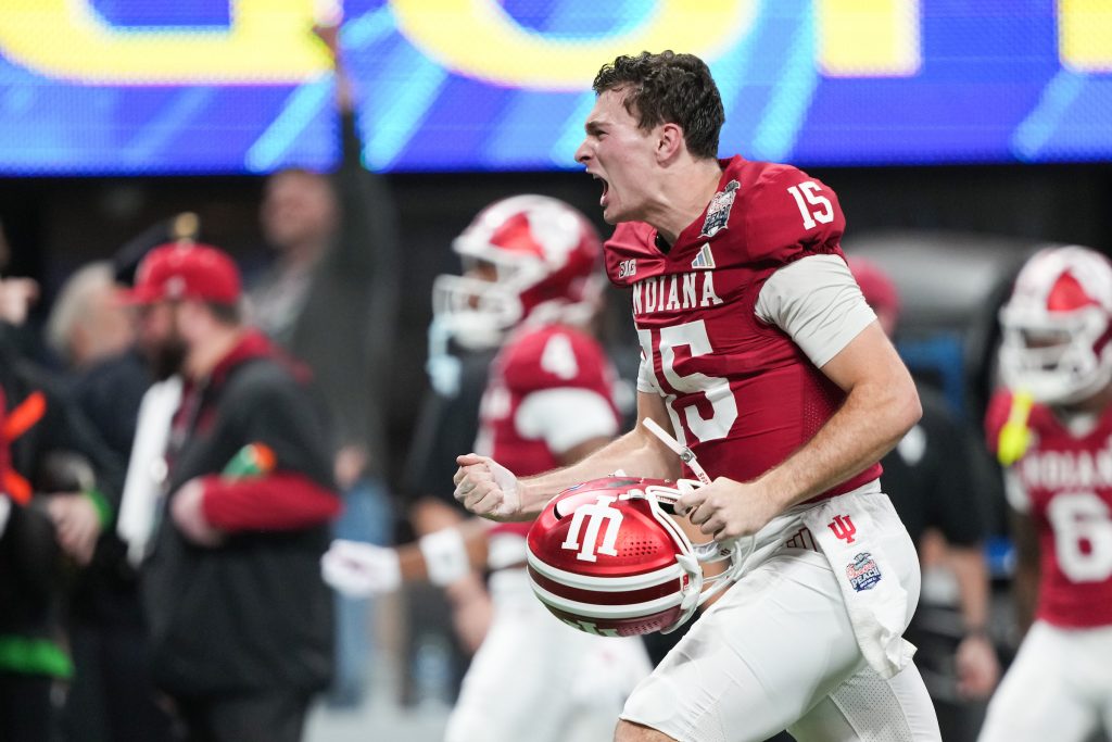Indiana Hoosiers quarterback Fernando Mendoza (15) celebrates a touchdown pass during the first half against the Oregon Ducks during the CFP semifinal at the Chick-fil-A Peach Bowl, Friday, Jan. 9, 2026 in Atlanta.  (Jason Parkhurst via Abell Images for the Chick-fil-A Peach Bowl)