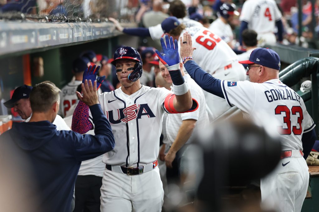 HOUSTON, TX - MARCH 09:   Aaron Judge #99 of Team USA celebrates with teammates in the dugout after hitting a two-run home run in the third inning during the 2026 World Baseball Classic Pool B game presented by Capital One between Team Mexico and Team USA at Daikin Park on Monday, March 9, 2026 in Houston, Texas. (Photo by Rob Tringali/WBCI/MLB Photos via Getty Images)